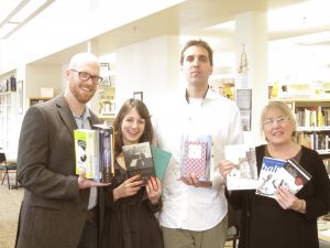 Grand Ronde: A book drop-off at Grand Ronde Tribal Library (from left: Michael McGriff, Natalie Garyet, Carl Adamshick, and Tribal librarian Marion Mercier)